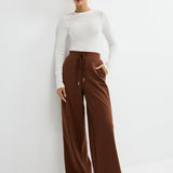 Панталони с връзка в талията и странични акценти