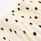 Безръкавен топ с точки и макси пола