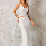 Рокля с изрязани акценти и прозрачни елементи